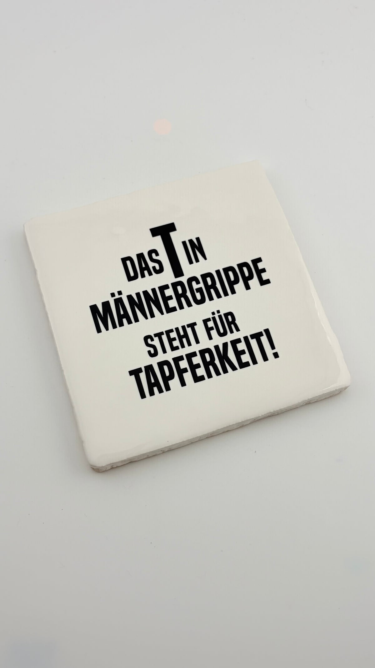 DAS T IN MÄNNERGRIPPE....